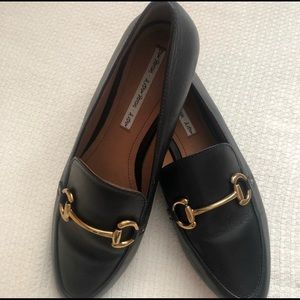 Gold buckle loafers